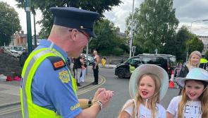 Cute moment young Taylor Swift fans gift garda a friendship bracelet at Dublin gig
