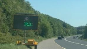 Cheeky Limerick fans hack into road sign in County Cork!