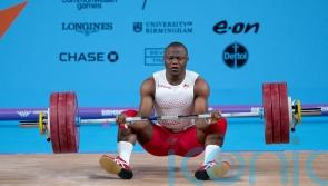 Weightlifter Cyrille Tchatchet’s medal hopes ended by body cramps