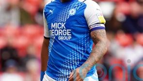 Peterborough end Lincoln’s unbeaten home record in style