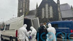 Man charged with murder after woman’s body found following house fire