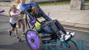 Rob Burrow pushed around Leeds fun run course by daughters on Father’s Day