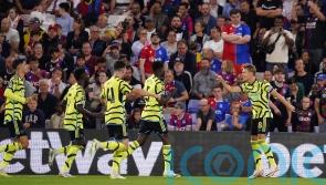 Martin Odegaard’s penalty earns 10-man Arsenal gritty victory at Crystal Palace