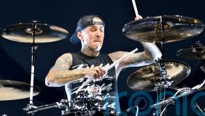 Blink-182 postpone gigs as Travis Barker rushes home for ‘urgent family matter’