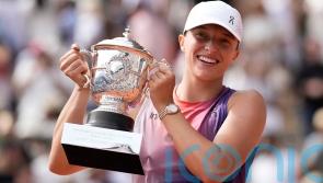 &lsquo;Queen of Clay&rsquo; Iga Swiatek races to third straight French Open title