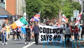 Harris expresses ‘disgust’ at Irish tricolour flown during attacks on police