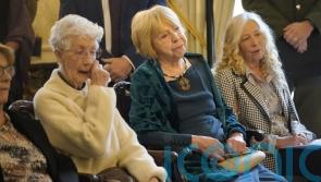 Higgins hails ‘tenacity’ of Stardust families at Aras reception