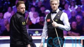 Judd Trump stages stirring recovery to see off Neil Robertson in York