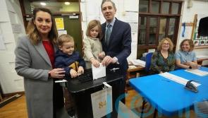 Irish premier casts vote with his family early as General Election under way