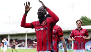 Walsall win at windy Harrogate to extend lead at top of League Two