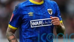 James Tilley header earns AFC Wimbledon win over Bradford