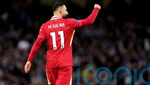 Liverpool move 11 points clear at the top after easing past Manchester City