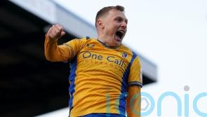 Mansfield end winless run in style as Peterborough are swept aside