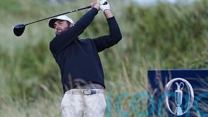 Flawless Scottie Scheffler leads at The Open but Rory McIlroy threat remains