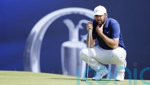 Open leader Scottie Scheffler starts with birdie to dampen hopes of chasing pack