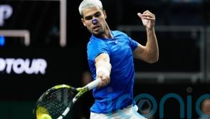 Carlos Alcaraz suffers injury scare during opener in Tokyo