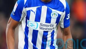 Ten-man Wigan return to winning ways against in-form Port Vale