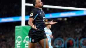 England complete autumn sweep by holding off Argentina fightback