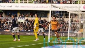 Kyle Joseph brace keeps Hull in play-off places after victory at 10-man Millwall