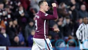 Hearts win with 10 men again after beating St Mirren to retain six-point lead