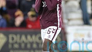 Derek McInnes proud of Hearts resilience to win after Beni Baningime red card