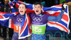 Matt Weston and Tabby Stoecker storm to history-making mixed team skeleton gold