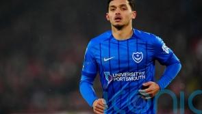 Late Andre Dozzell goal earns 10-man Pompey a draw with relegation rivals Oxford