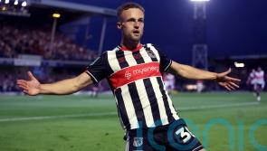 Grimsby finish in style to brush aside Gillingham and keep play-off hopes alive