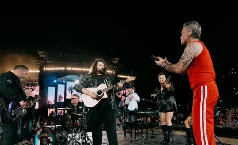 TikTok star Garron Noone overcomes on stage glitch thanks to Robbie Williams&rsquo; quick thinking