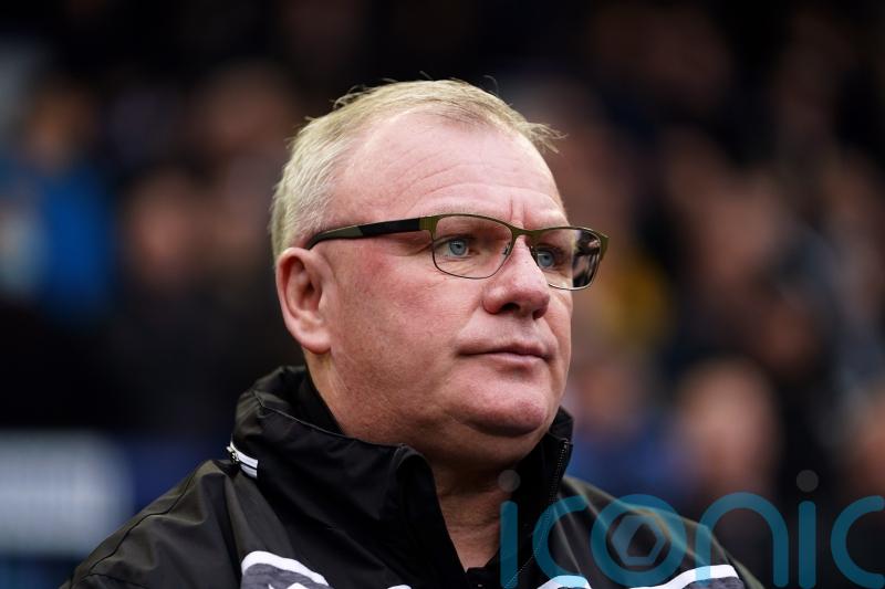 Steve Evans salutes Stevenage show as they rock Reading