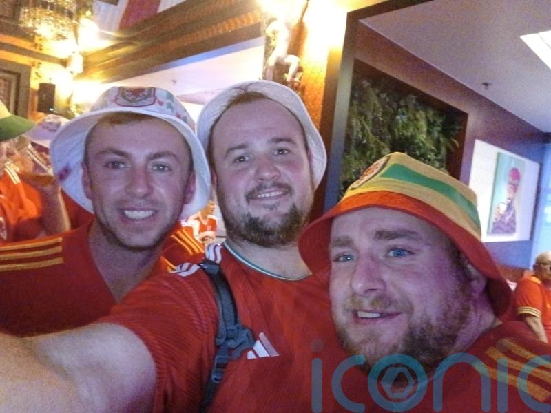 Fan flies last minute to watch Wales in World Cup – without telling girlfriend