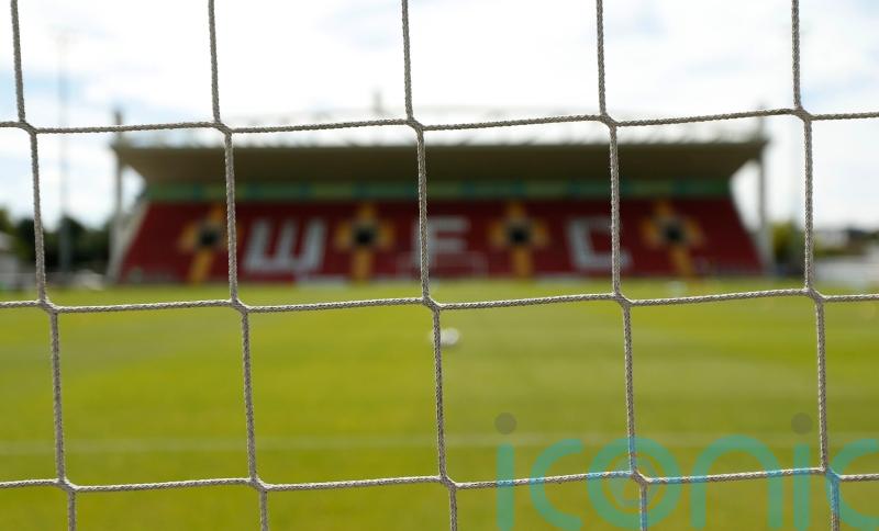 York win at Woking despite new manager’s absence