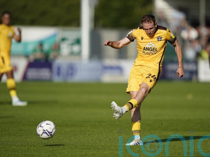 Rob Milsom earns Sutton win after Colchester lose Alan Judge to injury