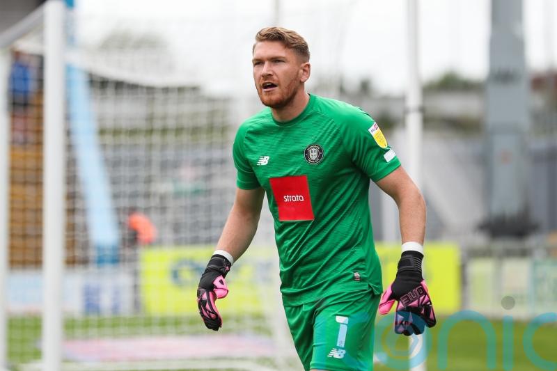 Inspired goalkeeper Mark Oxley secures point for Harrogate at Grimsby