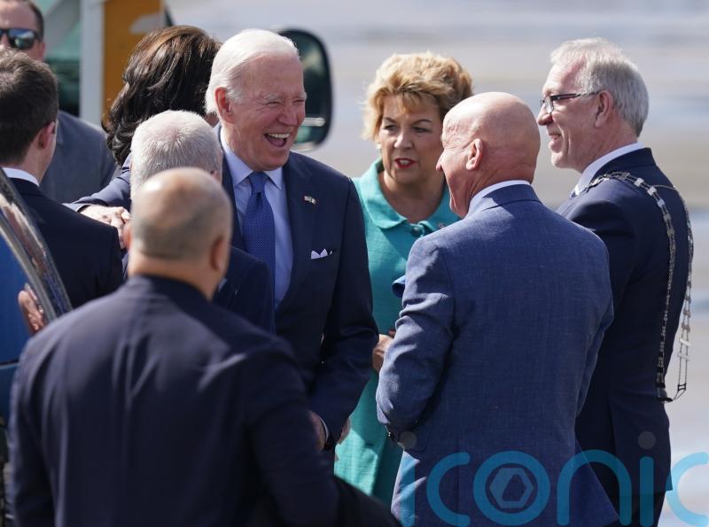 Joe Biden shares laugh with priest as he tours Catholic pilgrimage site