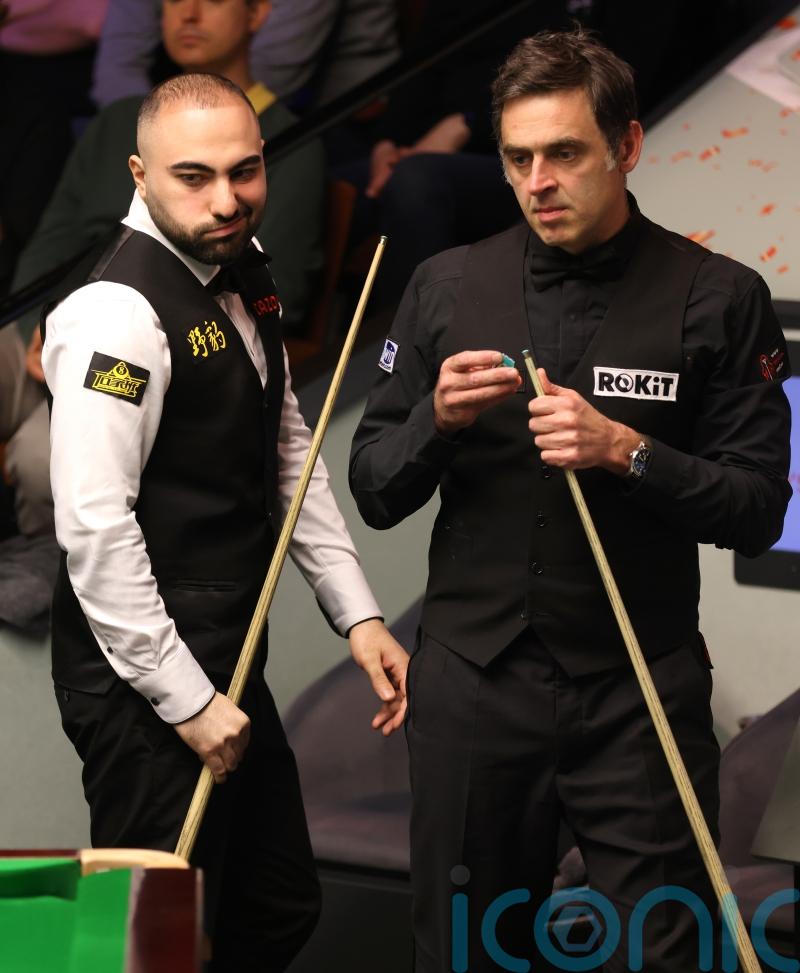 Ronnie O’Sullivan cashes in as wild Hossein Vafaei break-off shocks Crucible
