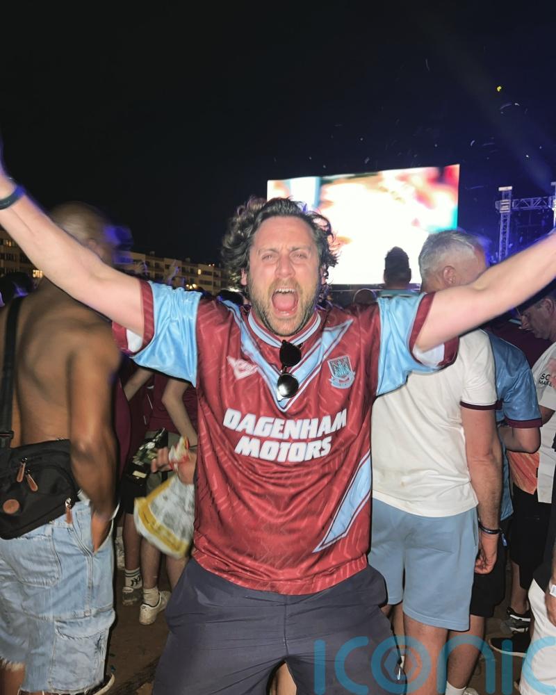West Ham fan parties with players outside hotel to celebrate club’s victory