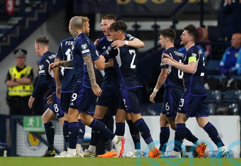 Scotland beat Georgia – and the weather – to move eight points clear in Group A
