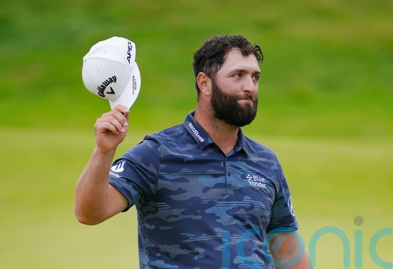 Jon Rahm shoots stunning 63 to surge into contention at The Open