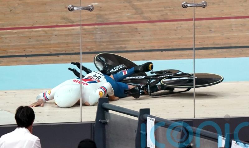 Great Britain’s team pursuit world title defence ends with crash in qualifying