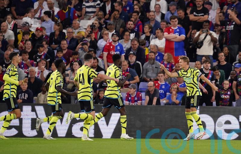 Martin Odegaard’s penalty earns 10-man Arsenal gritty victory at Crystal Palace