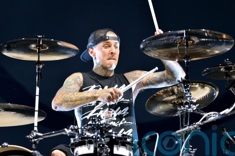 Blink-182 postpone gigs as Travis Barker rushes home for ‘urgent family matter’