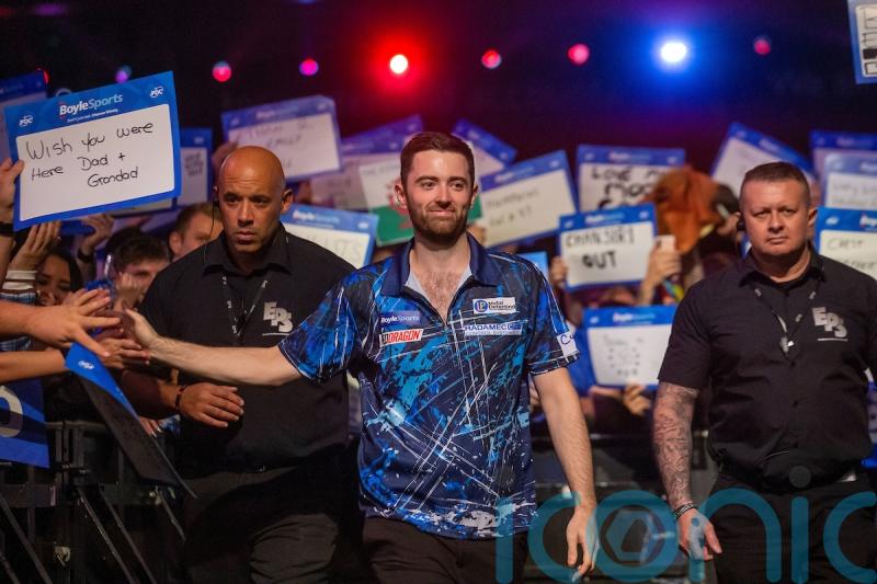 Luke Humphries beats Gerwyn Price to claim first major title at World Grand Prix