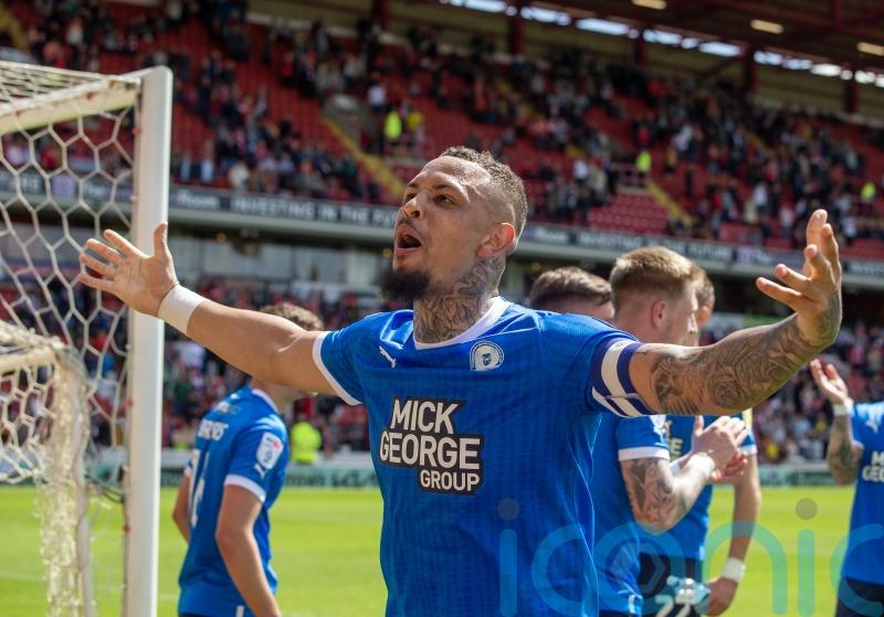 Jonson Clarke-Harris scores twice as Peterborough fight back against Barnsley