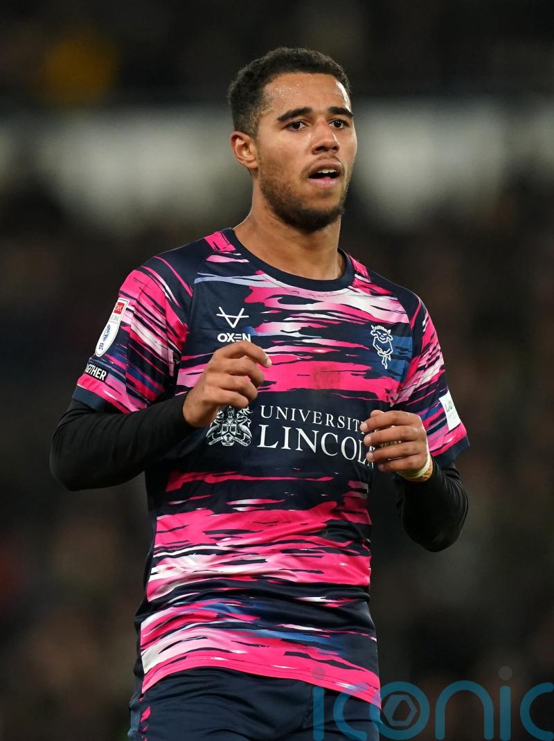 Ethan Erhahon’s last-gasp strike snatches Lincoln a point at Wycombe