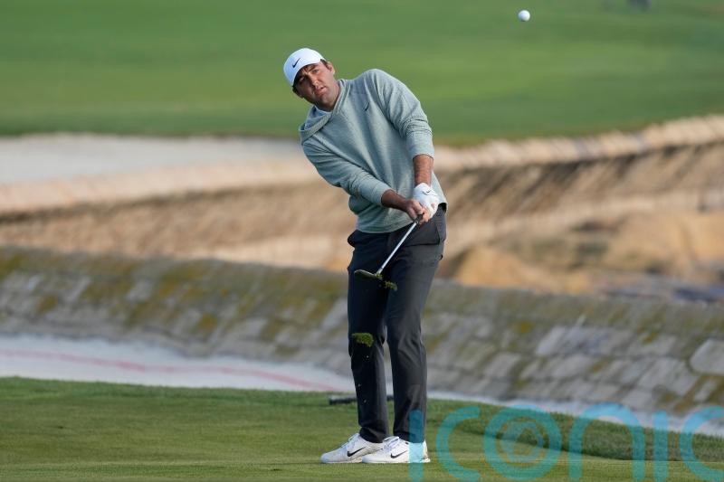 Scottie Scheffler hits 64 to share three-way lead at Pebble Beach
