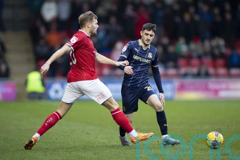 Crewe beat Sutton to keep pressure on League Two’s top three