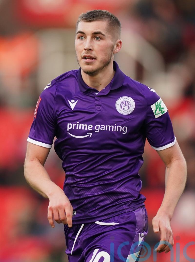 James Belshaw denies Dean Campbell from 12 yards as Harrogate hold Barrow