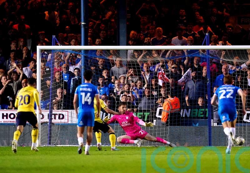 Cameron Brannagan’s penalty sends Oxford to League One play-off final