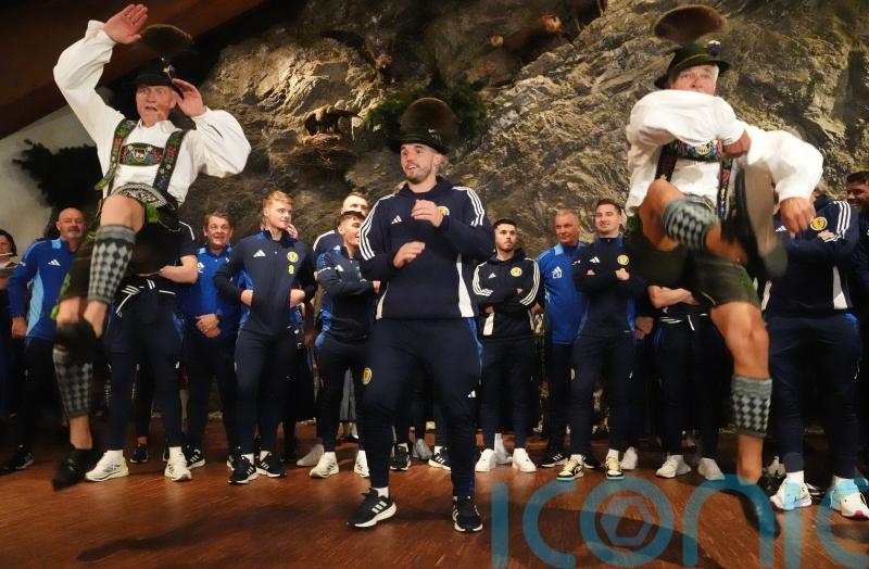 Moves like McGinn &ndash; Scotland midfielder throws some shapes on arrival in Germany